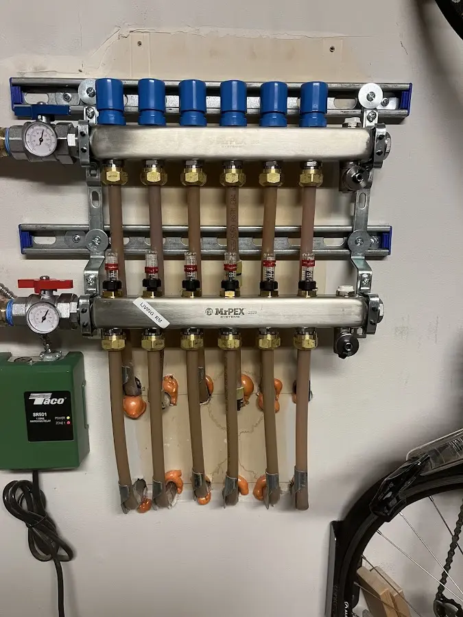 Plumber performing Water Heater Repair at a residential property in Wind Gap